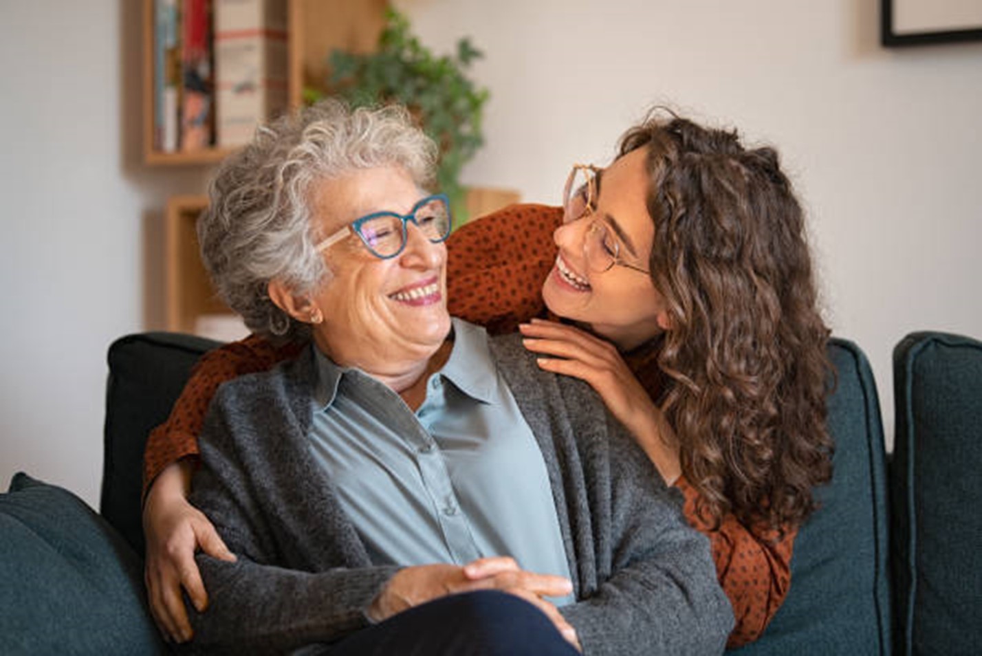 Daughter and senior mother smiling